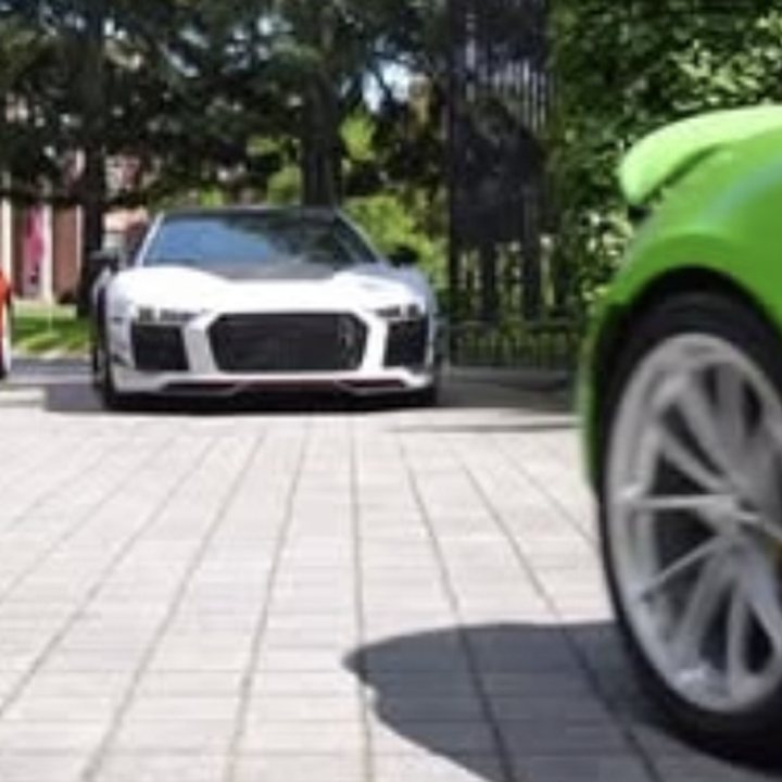 Cover frame of a viral Instagram reel featuring luxury sports cars